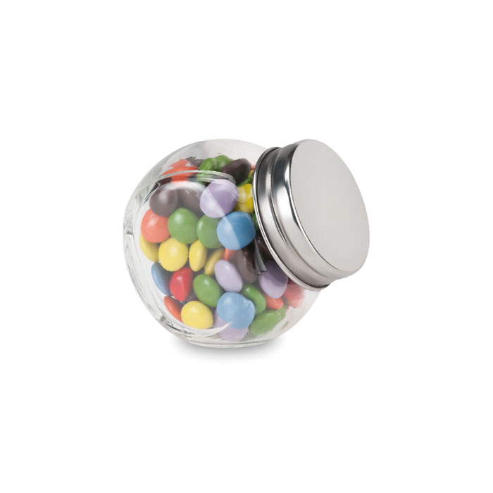 Šokoladiniai saldainiai stikliniame laikiklyje