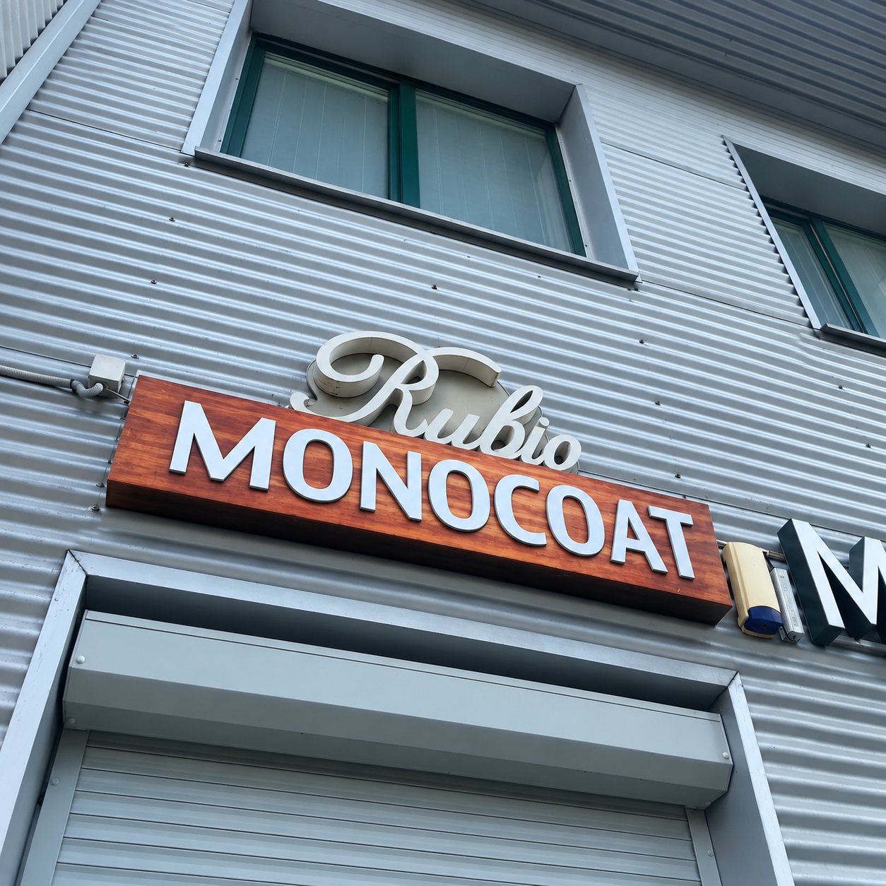 Iškaba „Rubio Monocoat“ ant pastato